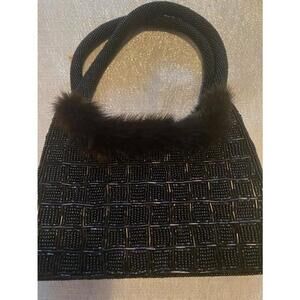 Mitchies fully beaded bag with mink trim